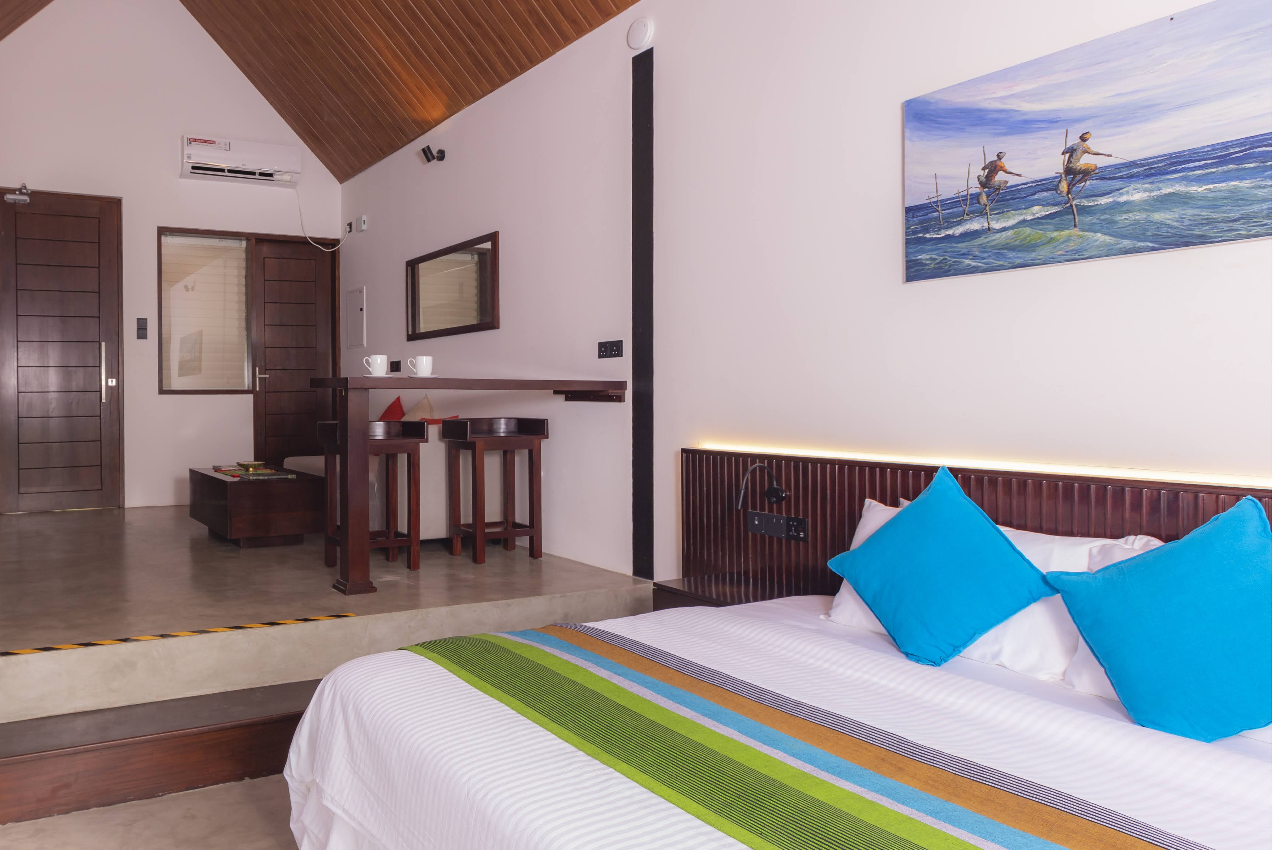 Luxury bedroom with lake view at Serenity Suite